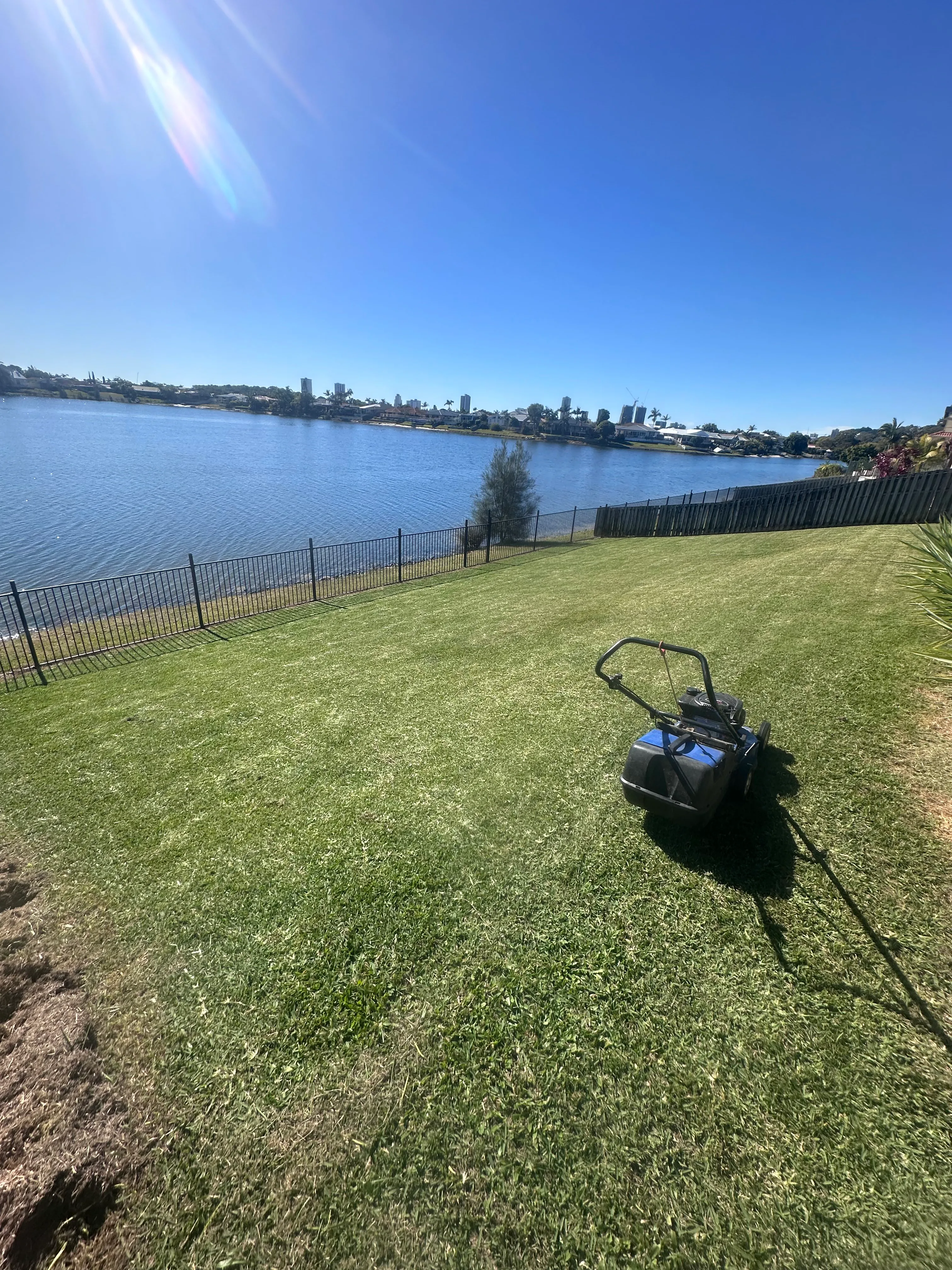 Freshly mowed Gold Coast lawn with a striped finish